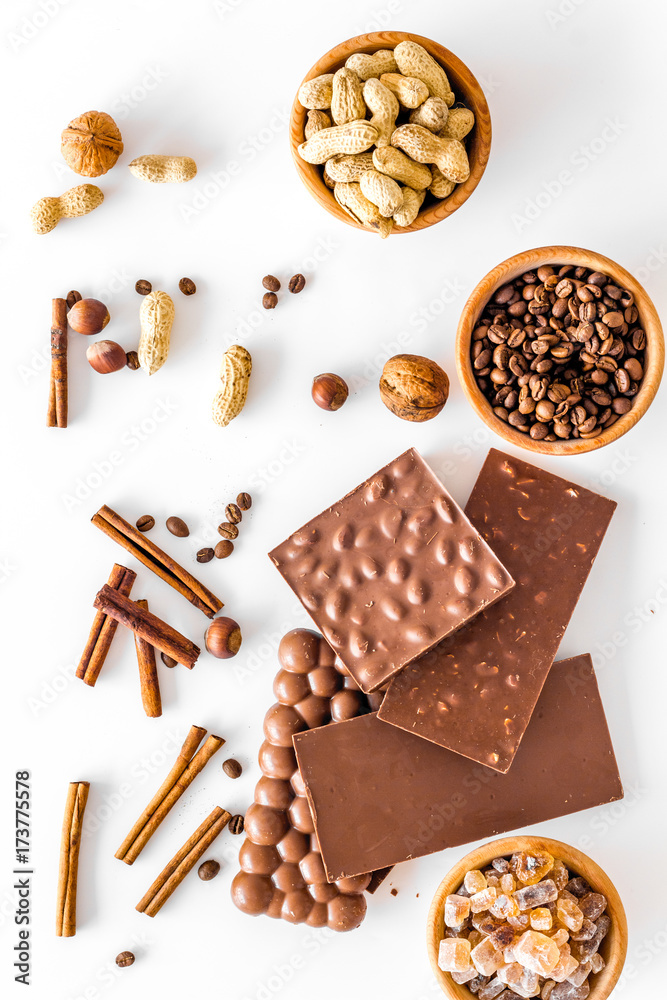 Ingredients for chocolates on white background top view