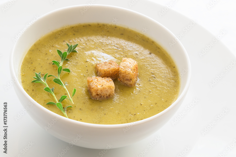 vegetable soup puree decorated with croutons and thyme vegetable soup puree decorated with croutons and thyme