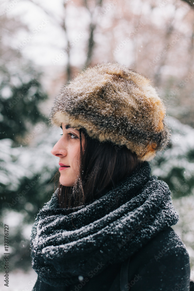 Portrait of a beautiful brunette woman with fur hat Portrait of a beautiful brunette woman with fur hat