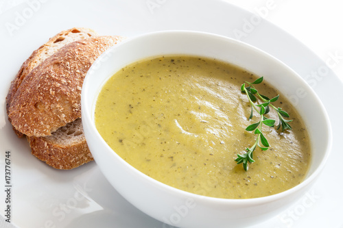 zucchini potato soup puree decorated with thyme