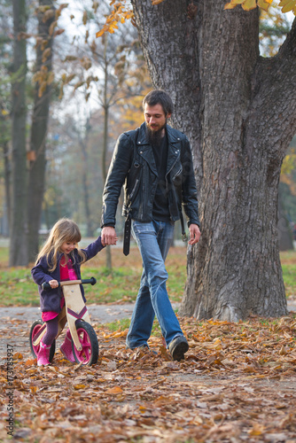 Rocker dad with his little girl photo