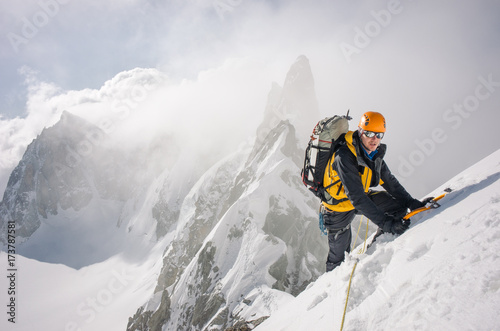 Mountaineer on high mountain expedition photo