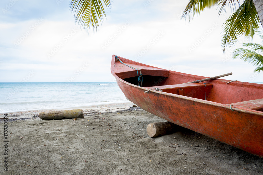 Amazing view of shoreline with red fishing boat Amazing view of shoreline with red fishing boat