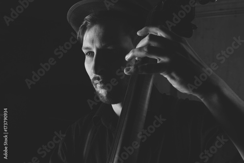 Musician with contrabass photo