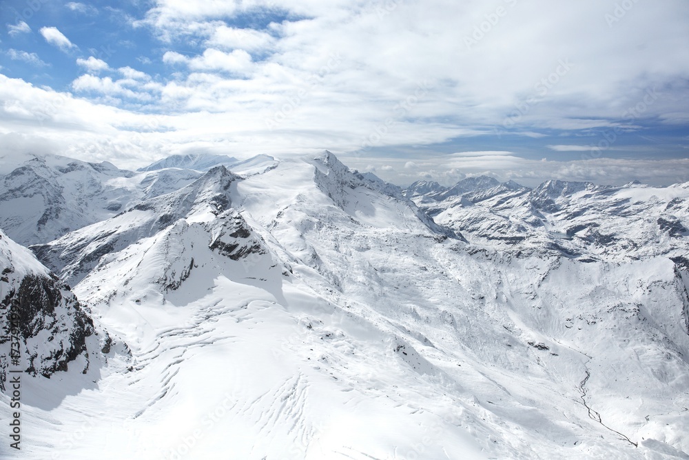 Winter view from the top of Kitzsteinhorn mountain, Kaprun ski resort, National Park Hohe Tauern, Austrian Alps, Europe.