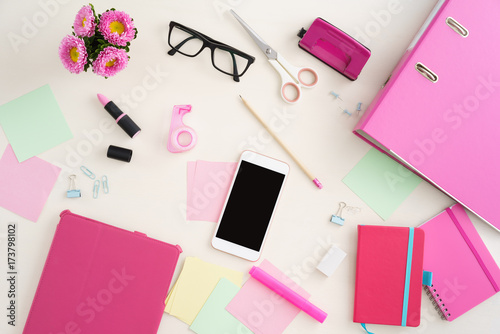 Collection of feminine desktop office objects photo