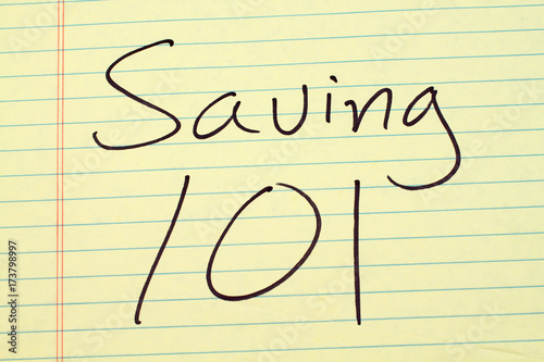 The words "Saving 101" on a yellow legal pad