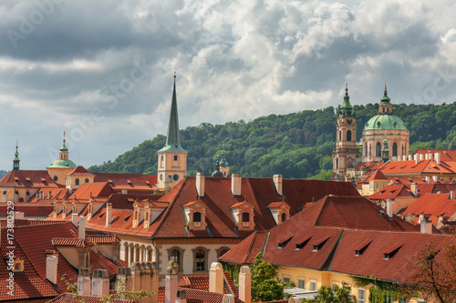 Lesser Town rooftops with storm clouds. The medieval settlement of Prague, Czech Republic. 