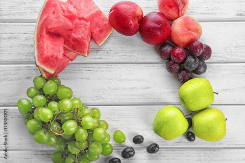 Fototapeta Naklejka Na Ścianę i Meble -  Composition with fresh fruits on wooden background