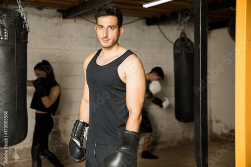 Attractive boxer in a gym