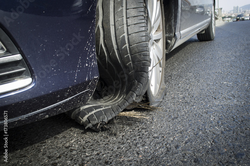 damaged tire after tire explosion at high speed on highway