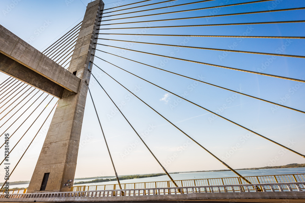 Fototapeta premium Cable-stayed bridge over Parana river, Brazil. Border of Sao Paulo and Mato Grosso do Sul states