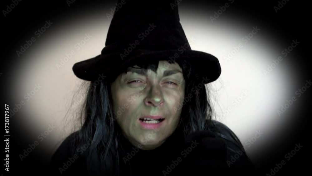 Spooky Halloween witch making a mean face Spooky Halloween witch making a mean face