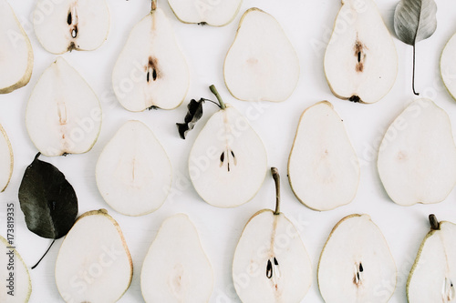 Pear slices pattern. Flat lay, top view minimal texture. photo