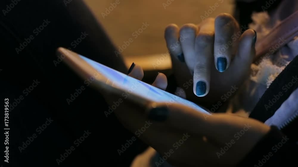 Closeup female hands using app city touristic map modern smartphone device evening girl typing touch screen cellphone reading pointing tapping internet surfing checking news notification side view