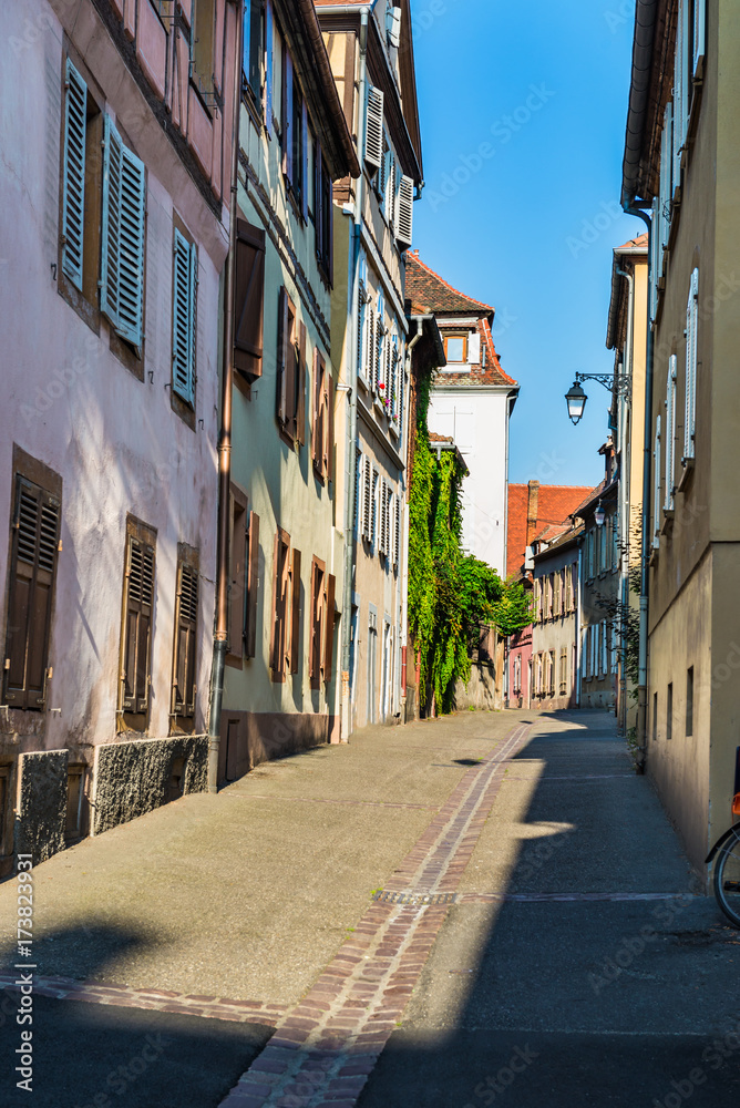 Colorful traditional french houses and shops in Colmar, Alsace, France