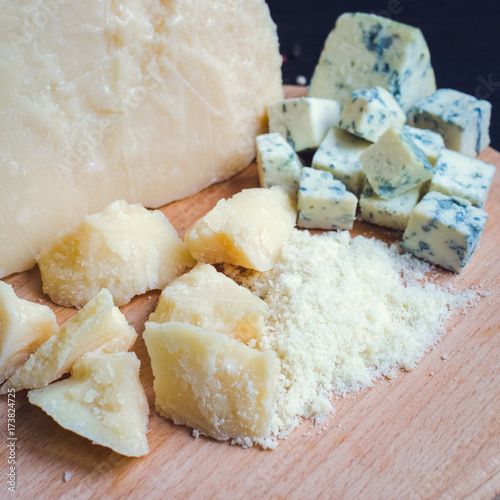 Grated Parmesan and sliced Blue cheese photo