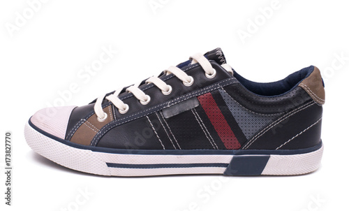 Fashion leather sneakers isolated on white background with clipping path.