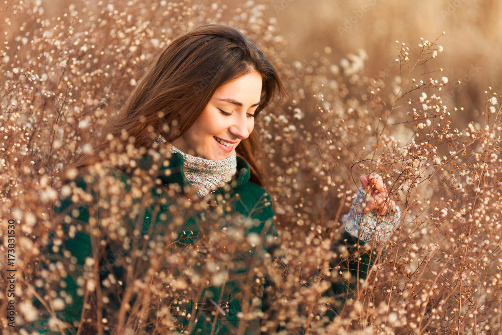 Portrait of beautiful young woman in a field Portrait of beautiful young woman in a field
