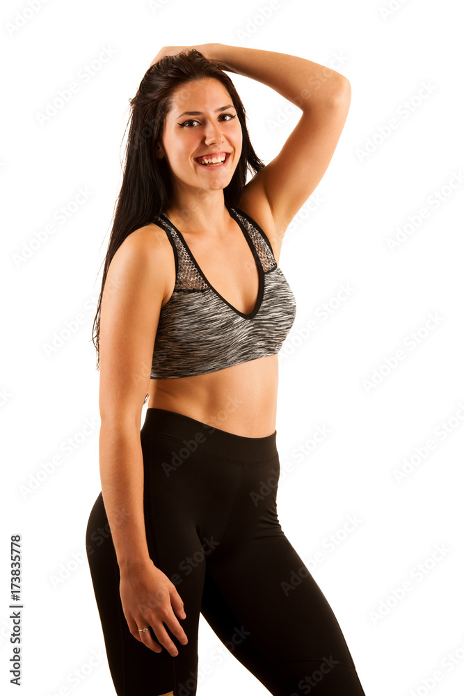 Active young woman - portrait of a sporty young girl isolated over white background Active young woman - portrait of a sporty young girl isolated over white background