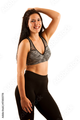 Active young woman - portrait of a sporty young girl isolated over white background