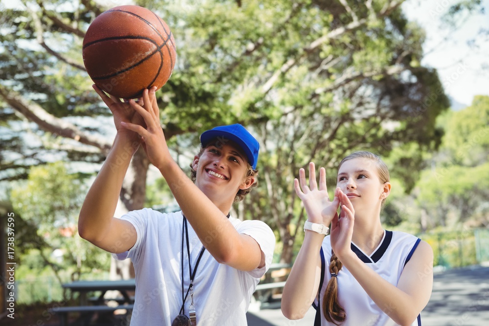 Coach training basketball player in court Coach training basketball player in court