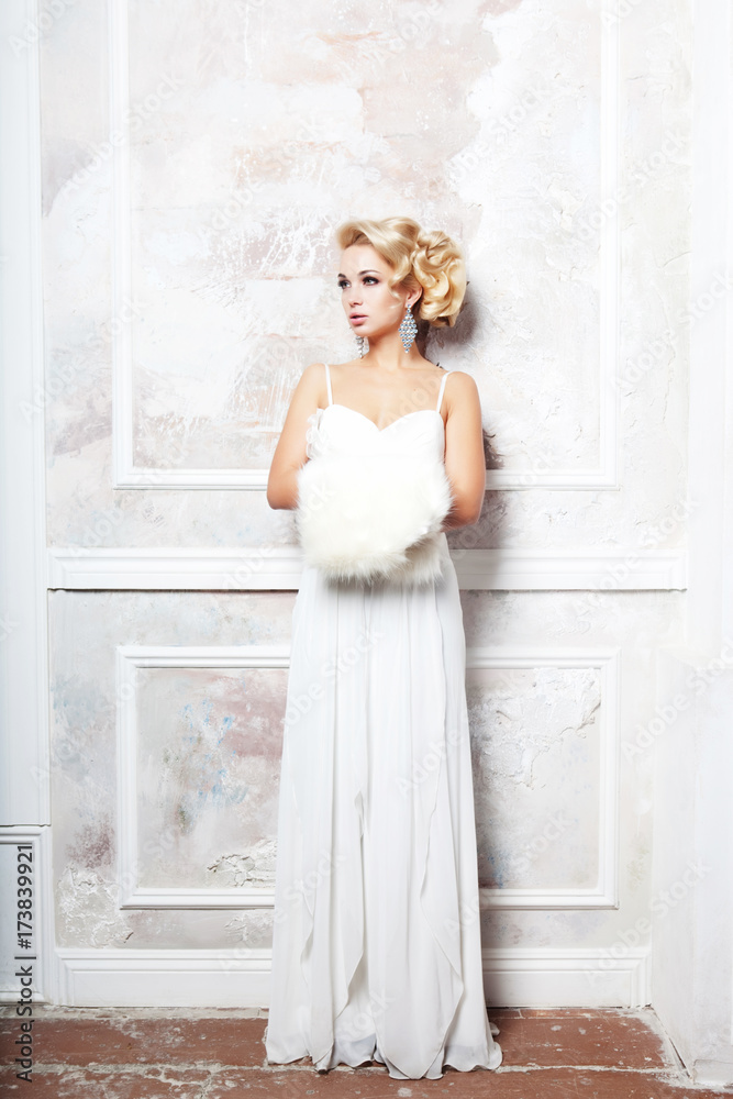 beautiful bride in a luxurious wedding dress, studio shot