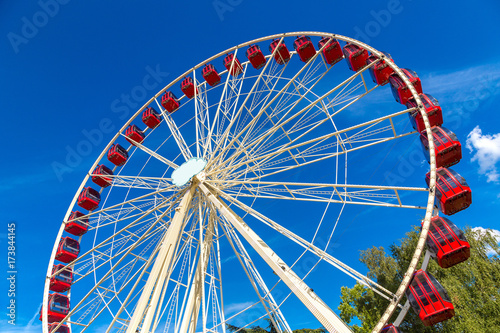 Ferris wheel on blue sky