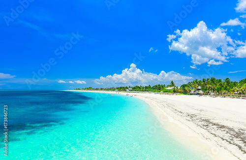 stunning gorgeous, amazing view of a tropical white sand beach and tranquil turquoise ocean at Cayo Coco island, Cuba on sunny beautiful summer day