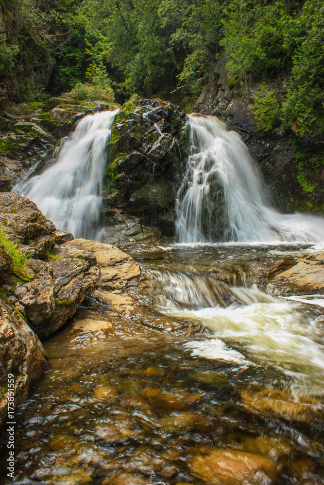 Fototapeta premium two waterfalls in the forest