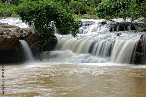 Fototapeta Naklejka Na Ścianę i Meble -  Tritong waterfall at Chaiphum Thailand when mud color.