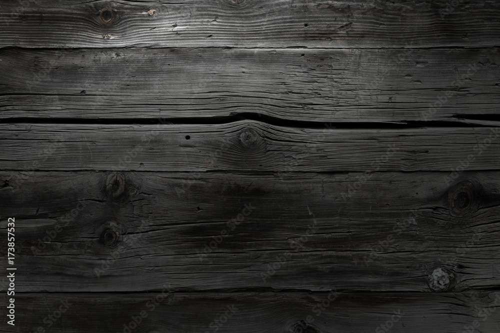 Naklejka premium Dark wooden background