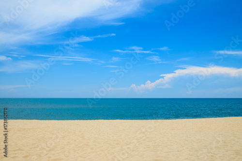 Beautiful beach and tropical sea with cloudy and blue sky