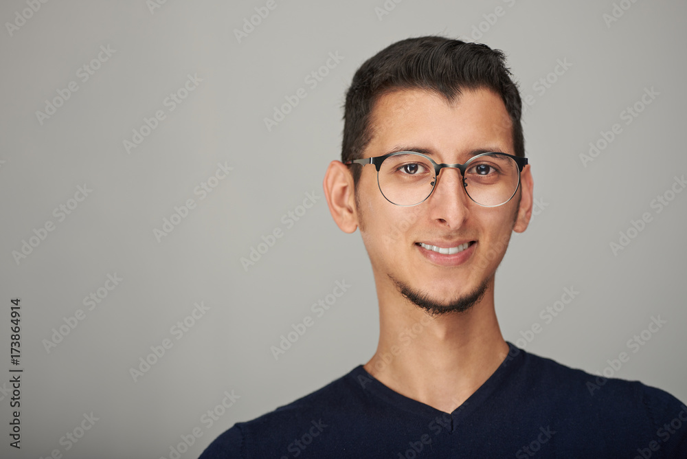 Portrait of hispanic man in glasses
