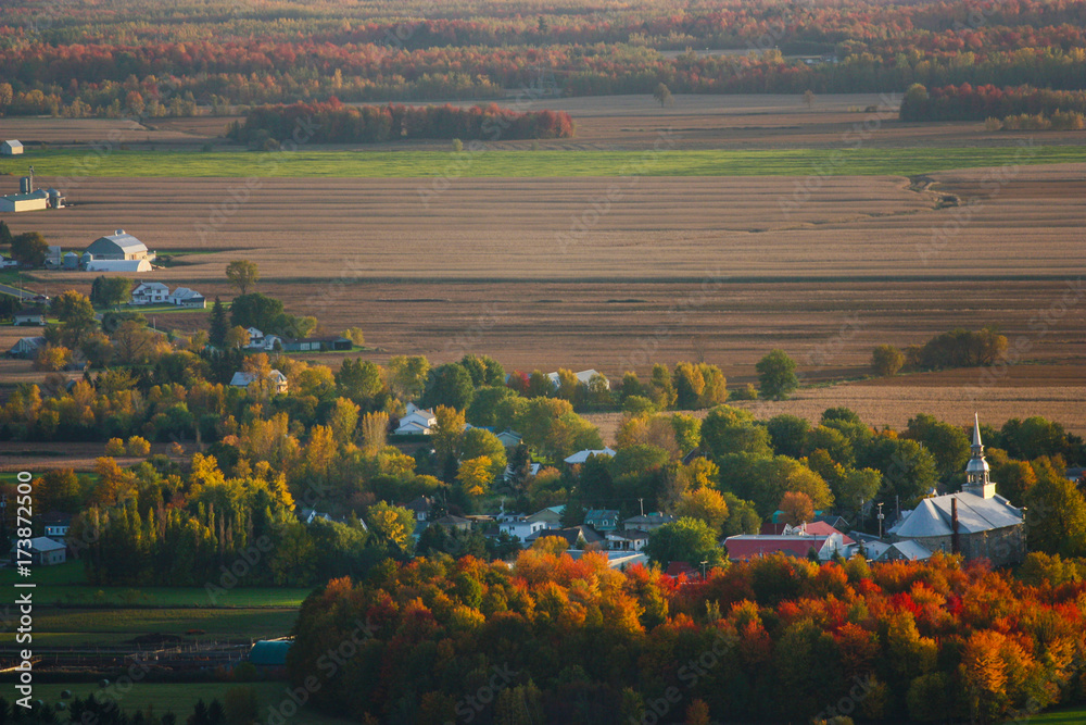 Obraz premium small town in quebec looking from the top of mount st-gregoire