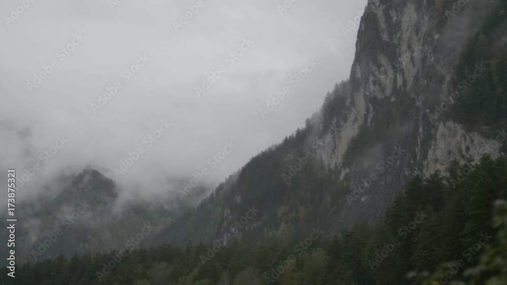 Clouds floating through the mountains in autumn Clouds floating through the mountains in autumn