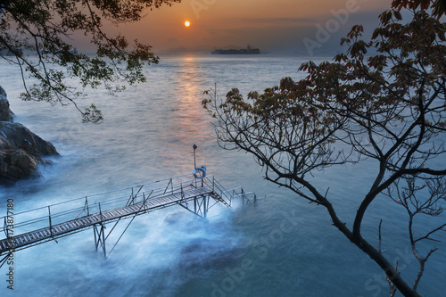Photography wooden jetty under sunset