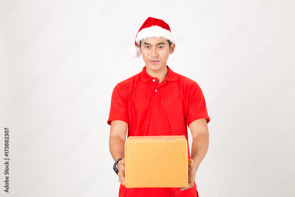 Delivery man holding boxes during Christmas. Isolated on a White Background. Delivery man holding boxes during Christmas. Isolated on a White Background.