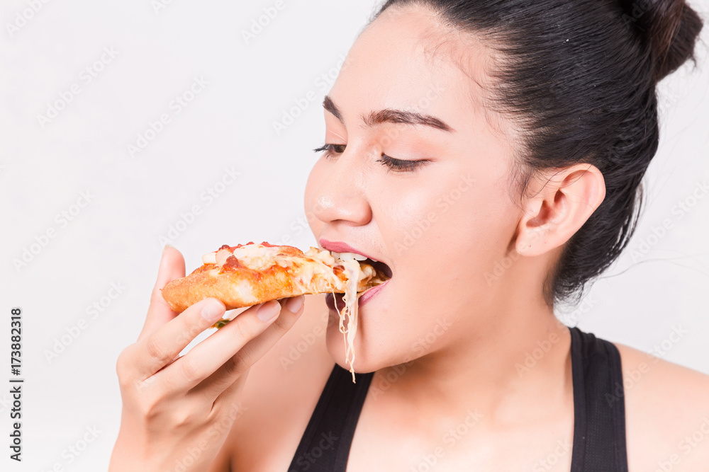 Happy girl eating tasty pizza. Isolated on a White Background. Happy girl eating tasty pizza. Isolated on a White Background.