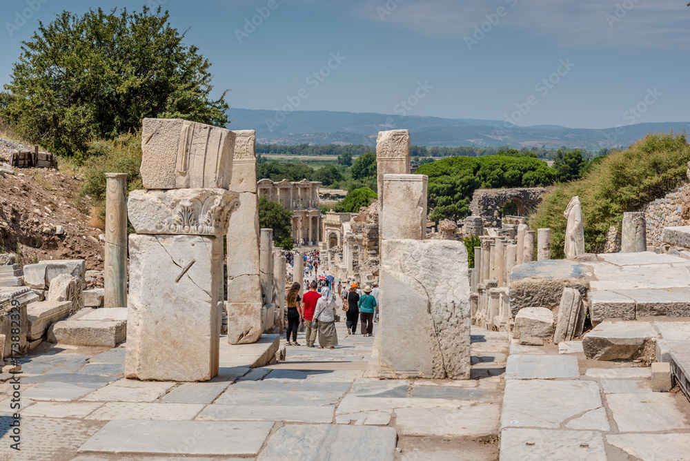 People visit Hercules Gate ancient ruins at Ephesus historical ancient city, in Selcuk,Izmir,Turkey:20 August 2017