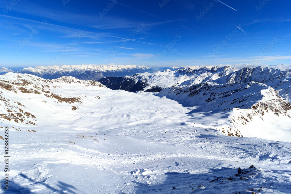 Obraz premium Mountain panorama with snow and blue sky in winter in Stubai Alps, Austria