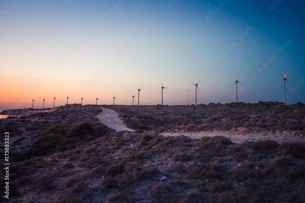 Wind tribunes,windmills on the sunset view