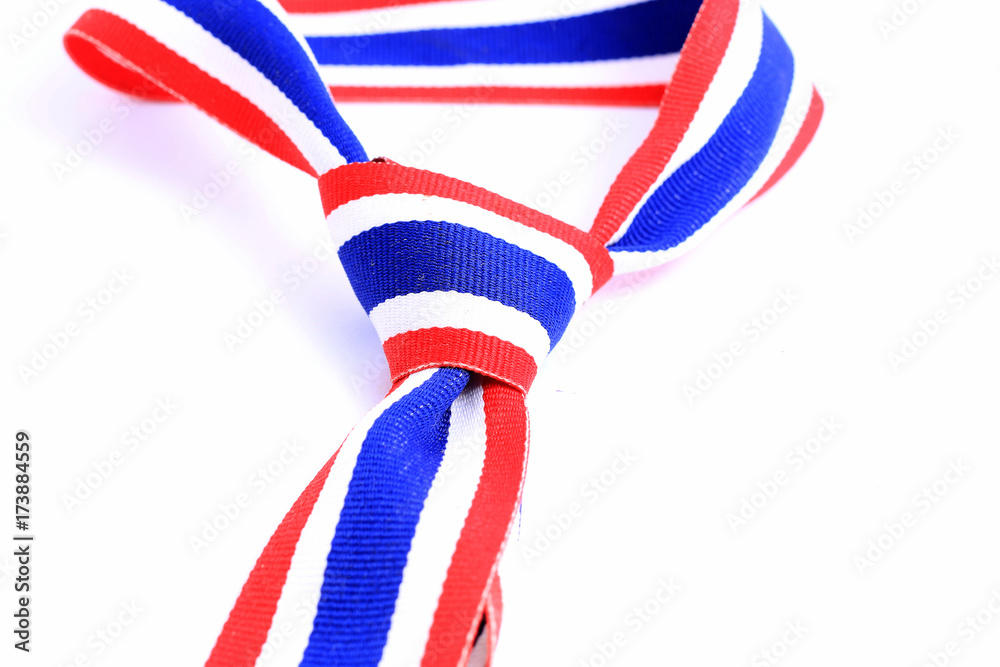 Obraz premium Ribbon neckties in colors of Thai flag isolated on white background.
