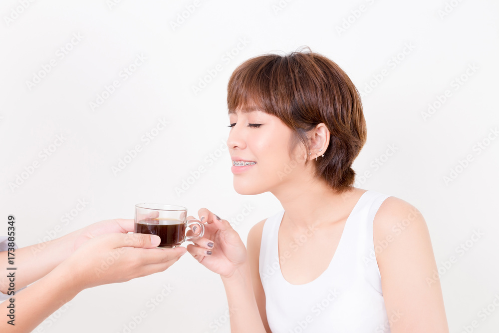 Barista giving cup of coffee to young asia woman. . Isolated on white background. Studio lighting. Concept for healthy. Barista giving cup of coffee to young asia woman. . Isolated on white background. Studio lighting. Concept for healthy.