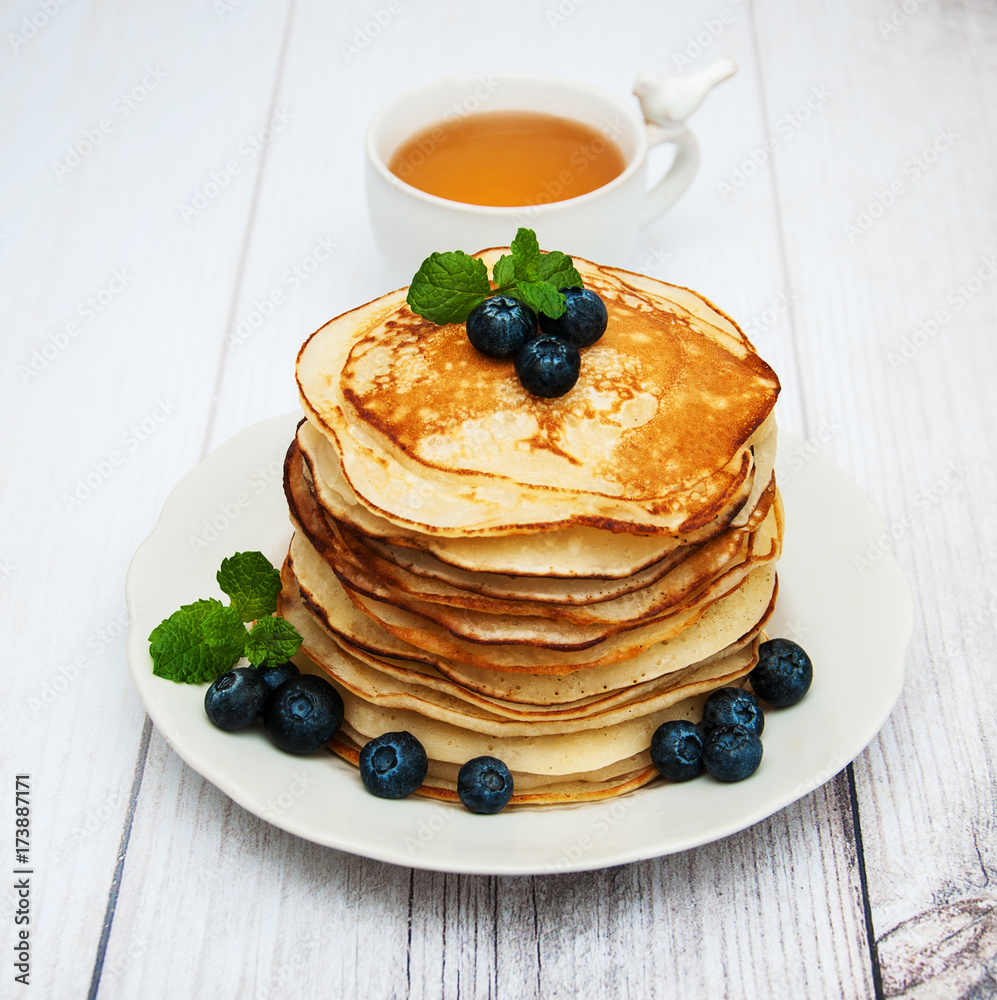 Plate with pancakes and blueberries Plate with pancakes and blueberries