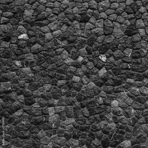Texture and background of granite stone wall.