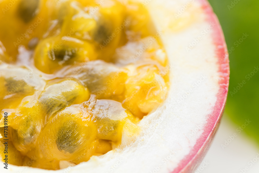 Ripe organic passion fruit cross cut, macro shot, selective focus Ripe organic passion fruit cross cut, macro shot, selective focus