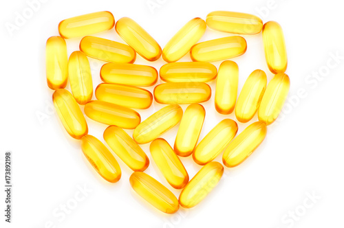Cod liver oil Omega 3 gel capsules in the form of heart isolated on white