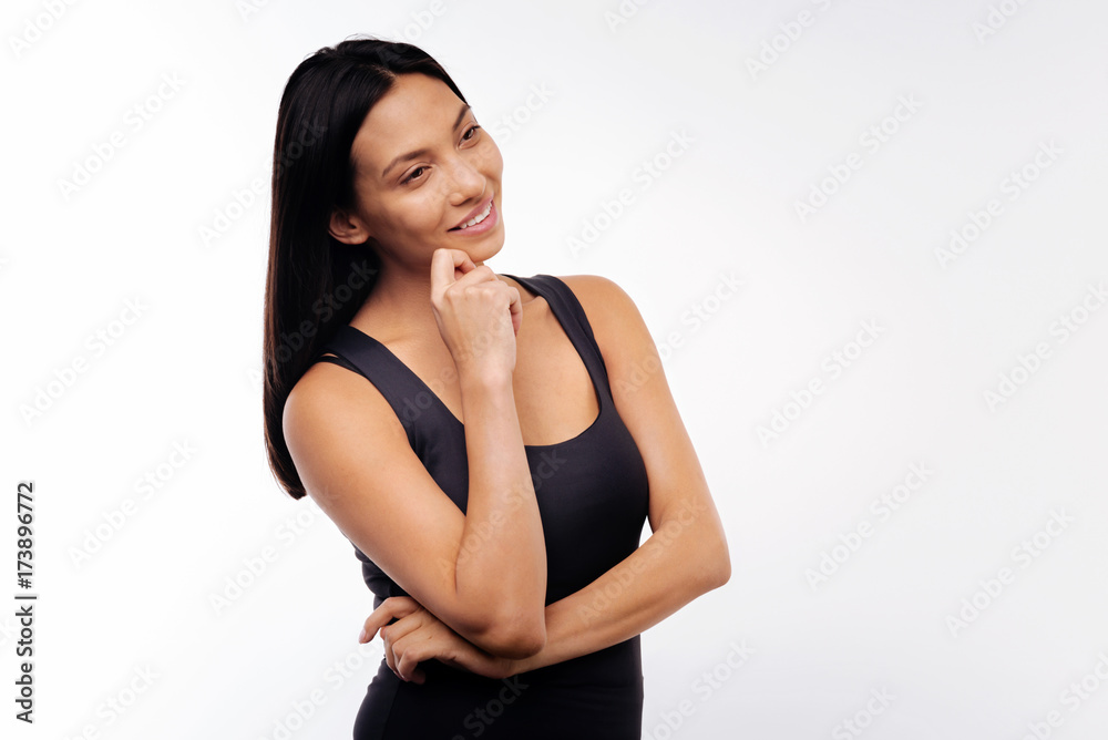 Charming young woman thinking about pleasant things Charming young woman thinking about pleasant things