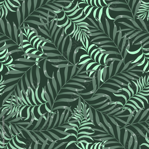Tropical background with palm leaves. Seamless floral pattern